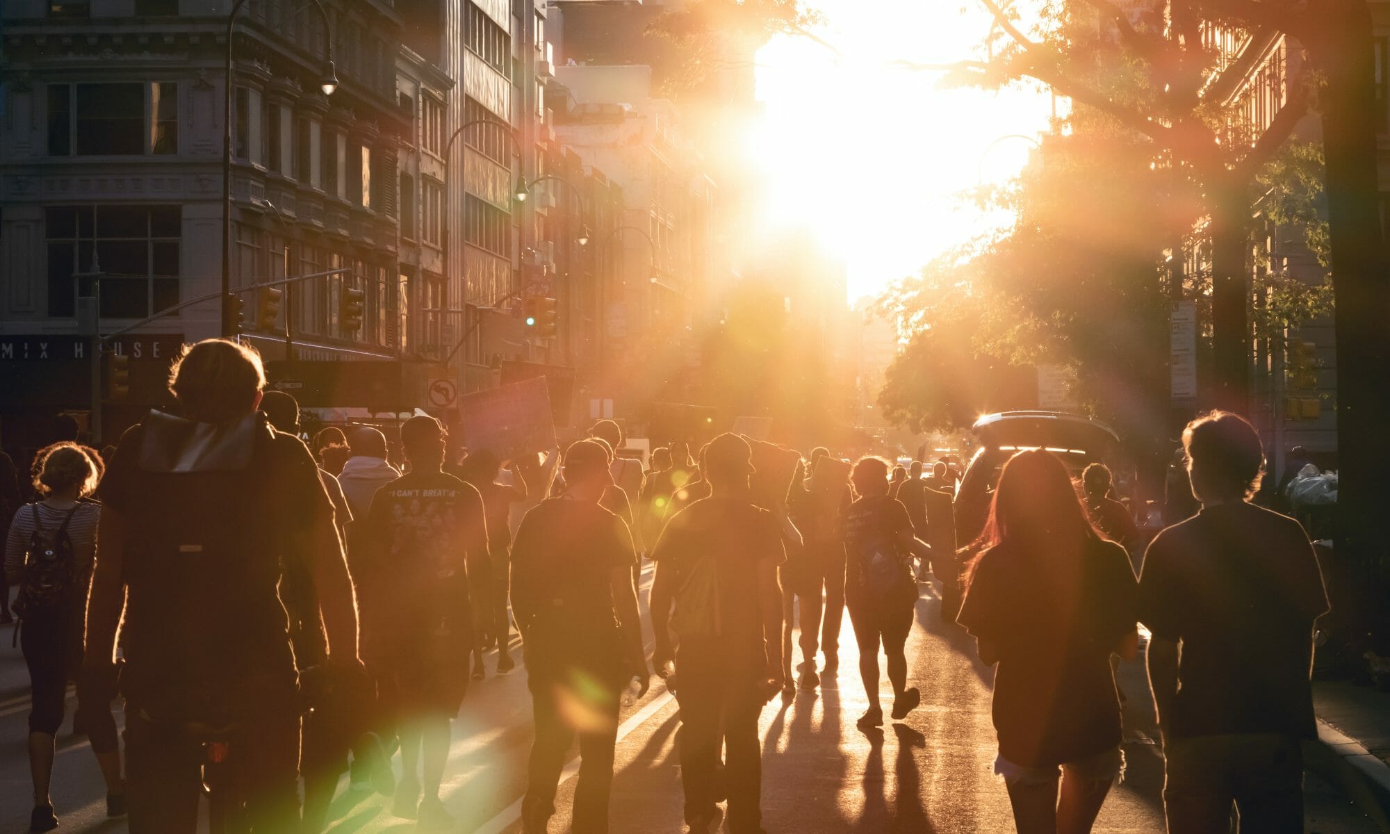 photo of protestors in NYC at sunset